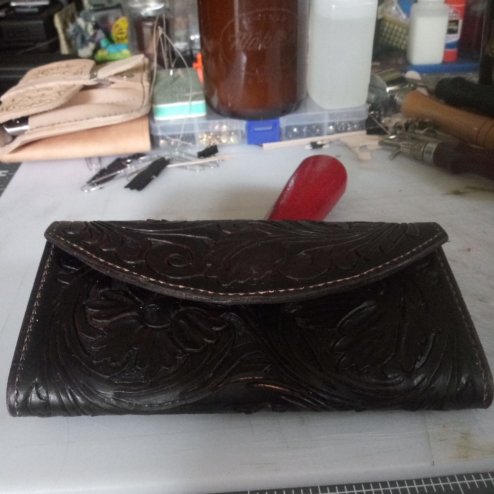 Handmade tooled clutch wallet